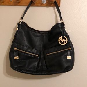 Michael Kors black leather bag with gold detailing